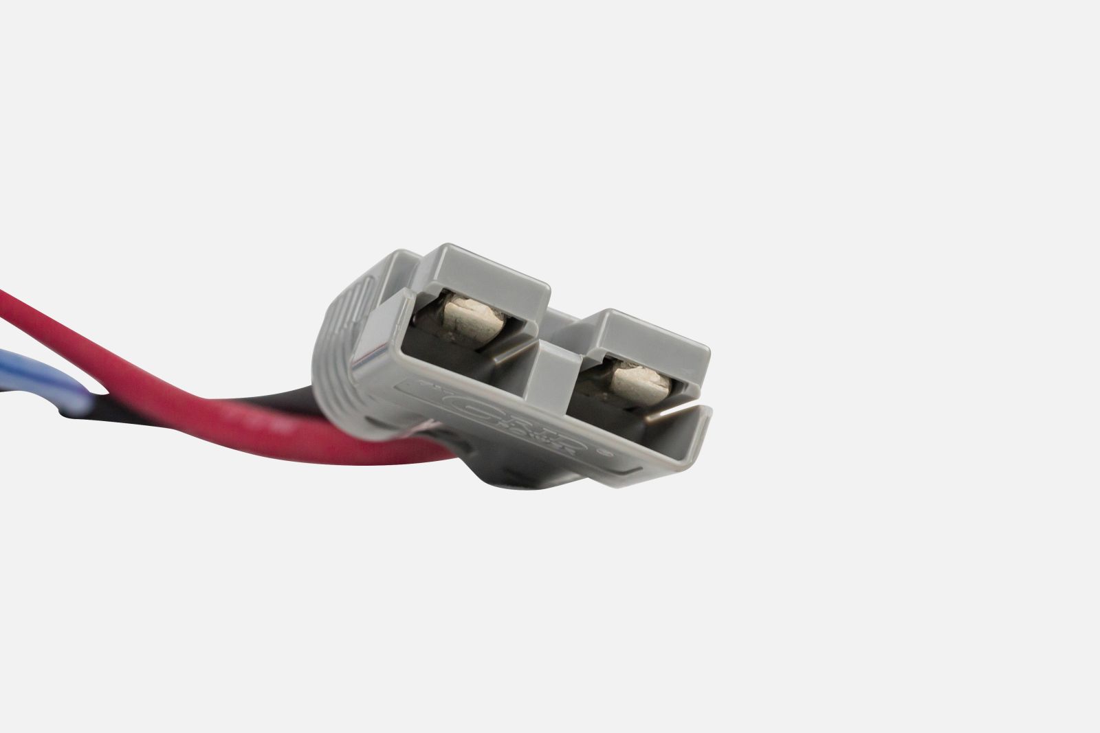 Close-up of DCX DC/DC charger housing and connections